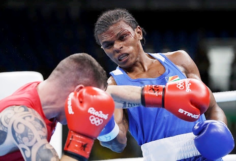 With blood on his face, Allisop (right) fought hard but still lost on points to Irish Joyce in his first round fight